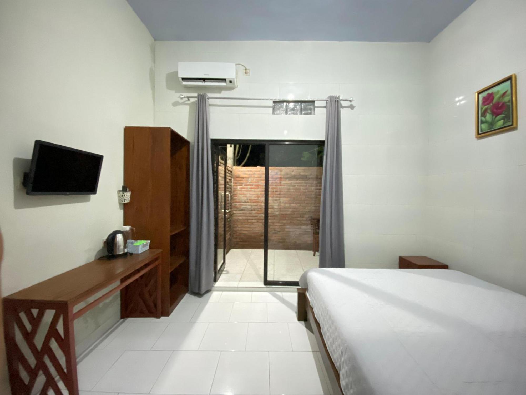 Ada Homestay Magelang Værelse billede